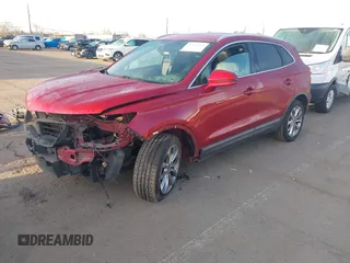 2015 Lincoln MKC with VIN 5LMCJ1A99FUJ09130, listed as a IAAI auction lot 41831811 with 125,804 mi miles. Bid and sale history available at carsss.com. Image 18.