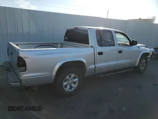 2004 Dodge Dakota Sport with VIN 1D7HL38N44S573883, listed as a Copart auction lot 74955984 with 165,510 mi miles and Salvage Title. Bid and sale history available at carsss.com. Image 3.