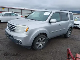 2015 Honda Pilot Touring with VIN 5FNYF4H94FB018152, listed as a IAAI auction lot 41812170 with 130,661 mi miles. Bid and sale history available at carsss.com. Image 2.