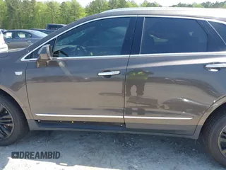 2019 Cadillac XT5 Luxury AWD z VIN 1GYKNDRS9KZ235687, wystawiony jako IAAI lot #41987360 z przebiegiem 78 784 mil mil oraz . Historia ofert i sprzedaży dostępna na DreamBid. Obrazek 15.