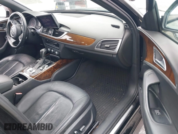 2016 Audi A6 2.0T Premium Plus with VIN WAUGFAFC6GN055826, listed as a IAAI auction lot 42011778 with 98,210 mi miles. Bid and sale history available at carsss.com. Image 5.