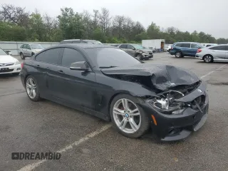 2015 BMW 4 Series 428i xDrive with VIN WBA4C9C54FG135161, listed as a Copart auction lot 59754515 with 140,518 mi miles and Salvage title. Bid and sale history available at DreamBid. Image 4.