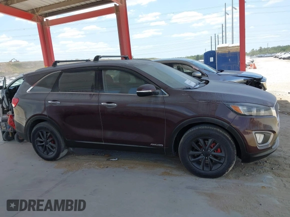 2016 Kia Sorento LX with VIN 5XYPGDA52GG139983, listed as a IAAI auction lot 42134996 with 120,259 mi miles. Bid and sale history available at carsss.com. Image 13.
