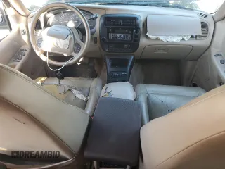 2000 Ford Explorer Eddie Bauer z VIN 1FMDU84P0YZB89831, wystawiony jako Copart lot #77874224 z przebiegiem 209 532 mil mil oraz Szkoda całkowita • Salvage title. Historia ofert i sprzedaży dostępna na DreamBid. Obrazek 8.