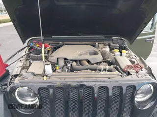 2023 Jeep Wrangler Unlimited Willys Sport with VIN 1C4HJXDM0PW515898, listed as a IAAI auction lot 41419267 with 10,964 mi miles and . Bid and sale history available at DreamBid. Image 10.