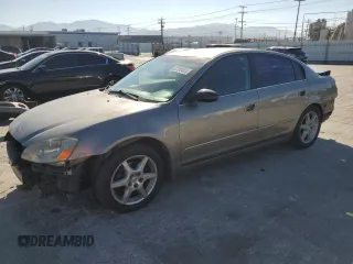 2003 Nissan Altima SE with VIN 1N4BL11D63C178902, listed as a Copart auction lot 63700405 with 214,193 mi miles and Salvage title. Bid and sale history available at DreamBid. Image 1.