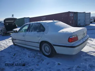 1998 BMW 7 Series 740il with VIN WBAGJ8321WDM21490, listed as a Copart auction lot 42097355 with 0 mi miles and Salvage Title. Bid and sale history available at carsss.com. Image 2.