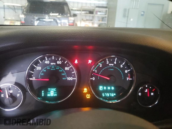 2014 Jeep Wrangler Unlimited Rubicon with VIN 1C4HJWFG7EL302897, listed as a Copart auction lot 48969425 with 57,976 mi miles and Salvage title. Bid and sale history available at DreamBid. Image 9.