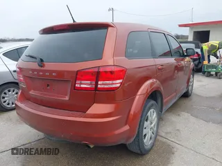 2014 Dodge Journey American Value Pkg with VIN 3C4PDCAB7ET258997, listed as a IAAI auction lot 41375834 with 230,868 mi miles. Bid and sale history available at carsss.com. Image 4.