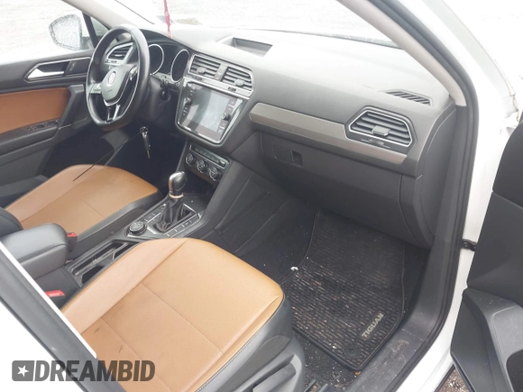 2018 Volkswagen Tiguan SEL with VIN 3VV2B7AX6JM059173, listed as a IAAI auction lot 42461175 with 86,679 mi miles and . Bid and sale history available at DreamBid. Image 5.