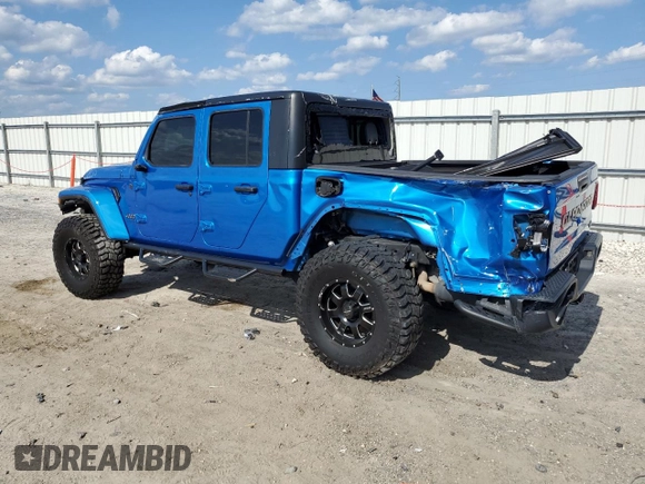 2020 Jeep Gladiator Overland with VIN 1C6HJTFG4LL162262, listed as a Copart auction lot 57261325 with 74,856 mi miles and Salvage title. Bid and sale history available at DreamBid. Image 2.