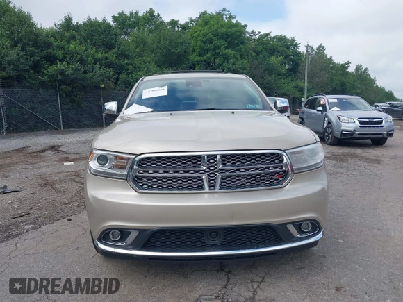 2015 Dodge Durango Citadel with VIN 1C4SDHET1FC702219, listed as a IAAI auction lot 42705080 with 159,995 mi miles and . Bid and sale history available at DreamBid. Image 6.