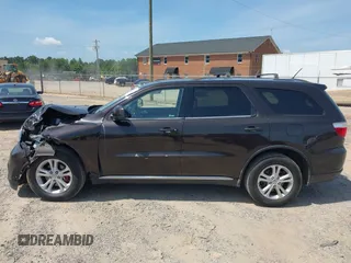 2013 Dodge Durango SXT with VIN 1C4RDJAG7DC580249, listed as a IAAI auction lot 42535723 with 199,626 mi miles and . Bid and sale history available at DreamBid. Image 14.