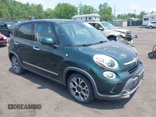 2014 FIAT 500L Trekking z VIN ZFBCFADH8EZ018575, wystawiony jako IAAI lot #42415012 z przebiegiem 100 301 mil mil oraz . Historia ofert i sprzedaży dostępna na DreamBid. Obrazek 1.