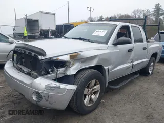 2006 Dodge Dakota ST z VIN 1D7HE28K76S702504, wystawiony jako IAAI lot #41926290 z przebiegiem 195 151 mil mil oraz . Historia ofert i sprzedaży dostępna na DreamBid. Obrazek 2.