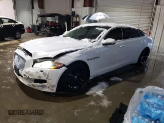 2013 Jaguar XJ Portfolio with VIN SAJWJ2GDXD8V54909, listed as a Copart auction lot 43620485 with 86,586 mi miles and Clean Title. Bid and sale history available at DreamBid. Image 1.