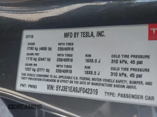 2018 Tesla Model 3 Long Range Battery z VIN 5YJ3E1EA9JF042319, wystawiony jako IAAI lot #41871931 z przebiegiem 138 837 mil mil oraz . Historia ofert i sprzedaży dostępna na DreamBid. Obrazek 9.