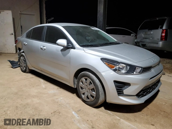 2023 Kia Rio S with VIN 3KPA24AD0PE603054, listed as a Copart auction lot 42997495 with 26,573 mi miles and Salvage Title. Bid and sale history available at carsss.com. Image 4.
