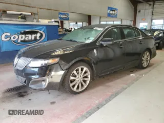 2012 Lincoln MKS EcoBoost with VIN 1LNHL9FT5CG804270, listed as a Copart auction lot 56517975 with 143,670 mi miles and Salvage title. Bid and sale history available at DreamBid. Image 1.