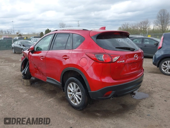 2014 Mazda CX-5 Touring z VIN JM3KE2CY3E0424892, wystawiony jako IAAI lot #42016801 z przebiegiem 173 350 mil mil oraz . Historia ofert i sprzedaży dostępna na DreamBid. Obrazek 3.