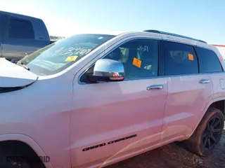 2017 Jeep Grand Cherokee Overland with VIN 1C4RJECG0HC636342, listed as a IAAI auction lot 41139209 with 145,760 mi miles. Bid and sale history available at carsss.com. Image 14.