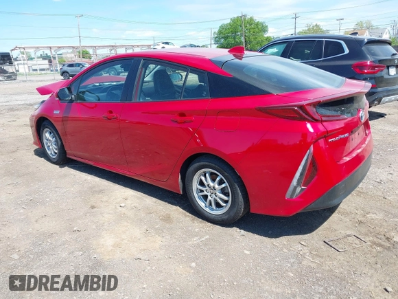 2021 Toyota Prius LE with VIN JTDKAMFP6M3192515, listed as a IAAI auction lot 42302003 with 74,247 mi miles and . Bid and sale history available at DreamBid. Image 3.