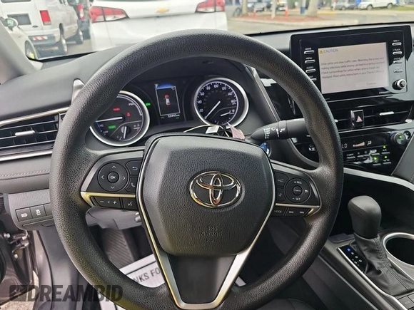 2022 Toyota Camry Hybrid LE with VIN 4T1C31AK0NU580162, listed as a IAAI auction lot 42036207 with 55,442 mi miles and . Bid and sale history available at DreamBid. Image 1.