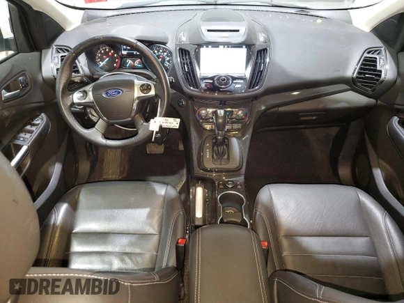 2016 Ford Escape Titanium with VIN 1FMCU9J93GUB78230, listed as a Copart auction lot 51661025 with 98,515 mi miles and Salvage Title. Bid and sale history available at DreamBid. Image 8.