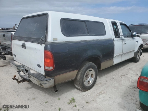 1999 Ford F-150 Work Series with VIN 1FTRX17W0XNA86913, listed as a Copart auction lot 75621254 with 0 mi miles and Salvage Title. Bid and sale history available at carsss.com. Image 3.