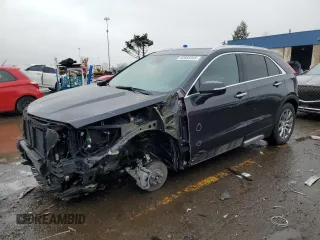 2023 Cadillac XT4 AWD Premium Luxury z VIN 1GYFZDR40PF101649, wystawiony jako Copart lot #52585345 z przebiegiem Nie podano mil oraz Czysty tytuł • Clean title. Historia ofert i sprzedaży dostępna na DreamBid. Obrazek 1.