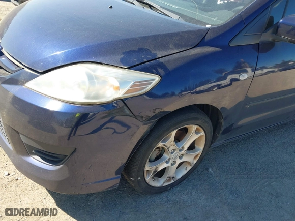 2009 Mazda Mazda5 Sport with VIN JM1CR293090344744, listed as a IAAI auction lot 42042896 with 215,303 mi miles. Bid and sale history available at carsss.com. Image 6.