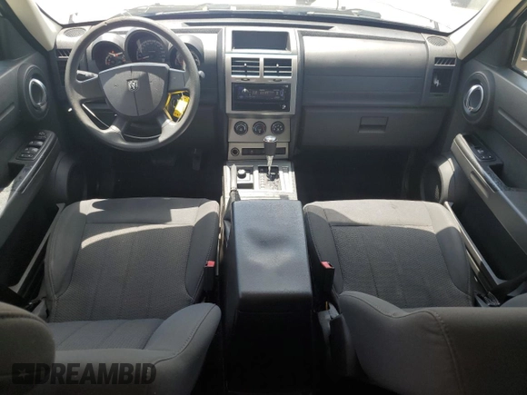 2011 Dodge Nitro Heat with VIN 1D4PU4GK0BW604975, listed as a Copart auction lot 56979275 with 160,494 mi miles and Salvage title. Bid and sale history available at DreamBid. Image 8.