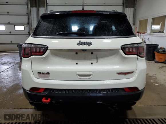 2019 Jeep Compass Trailhawk with VIN 3C4NJDDB5KT703542, listed as a Copart auction lot 54506705 with 86,178 mi miles and Salvage Title. Bid and sale history available at DreamBid. Image 6.
