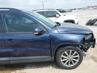 2015 Volkswagen Tiguan SE with VIN WVGAV7AX1FW508313, listed as a IAAI auction lot 42120704 with 136,405 mi miles and . Bid and sale history available at DreamBid. Image 6.