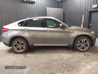 2014 BMW X6 50i z VIN 5UXFG8C55EL592995, wystawiony jako IAAI lot #41724960 z przebiegiem 137 112 mil mil oraz . Historia ofert i sprzedaży dostępna na DreamBid. Obrazek 14.