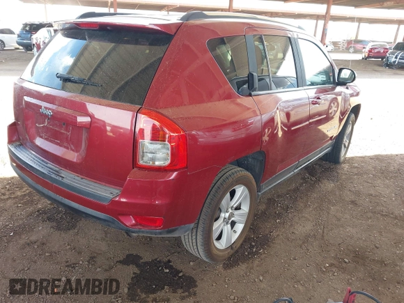 2011 Jeep Compass Latitude with VIN 1J4NT1FB0BD151647, listed as a IAAI auction lot 41950743 with 128,238 mi miles. Bid and sale history available at carsss.com. Image 4.