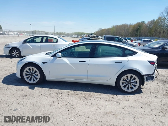 2023 Tesla Model 3 with VIN 5YJ3E1EA7PF592966, listed as a IAAI auction lot 41879794 with 13,423 mi miles and . Bid and sale history available at carsss.com. Image 15.
