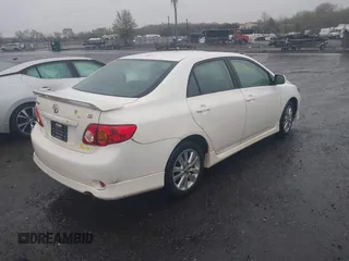 2010 Toyota Corolla with VIN 2T1BU4EEXAC413978, listed as a IAAI auction lot 41953898 with 121,676 mi miles. Bid and sale history available at carsss.com. Image 4.