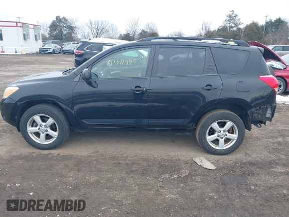 2008 Toyota RAV4 with VIN JTMBK35V385053914, listed as a IAAI auction lot 41311995 with 247,528 mi miles. Bid and sale history available at carsss.com. Image 15.