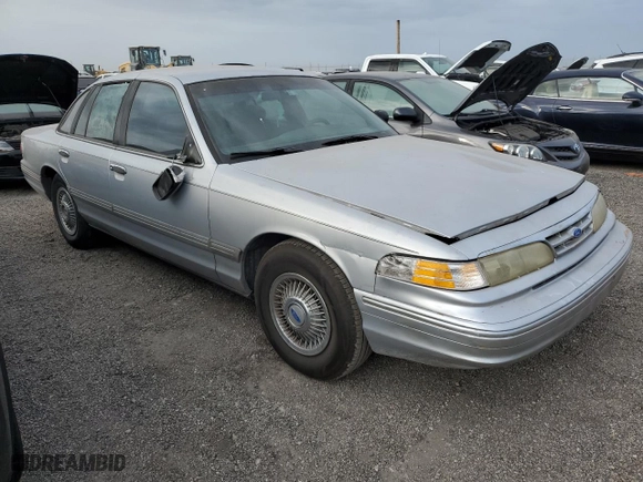 1997 Ford Crown Victoria with VIN 2FALP73W2VX230784, listed as a Copart auction lot 76339234 with 234,792 mi miles and Non Repairable. Bid and sale history available at carsss.com. Image 4.