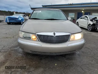 2001 Lincoln Continental with VIN 1LNHM97V41Y633841, listed as a Copart auction lot 86695664 with 166,931 mi miles and Salvage Title. Bid and sale history available at carsss.com. Image 5.