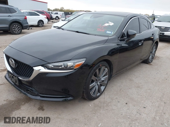 2020 Mazda 6 Grand Touring with VIN JM1GL1TY5L1513949, listed as a IAAI auction lot 40953540 with 55,616 mi miles and . Bid and sale history available at DreamBid. Image 2.