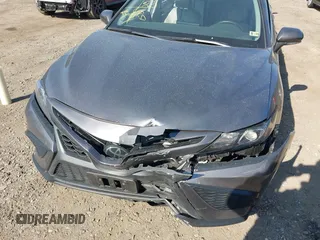 2023 Toyota Camry SE z VIN 4T1G11BK6PU096991, wystawiony jako IAAI lot #42062219 z przebiegiem 82 824 mil mil oraz . Historia ofert i sprzedaży dostępna na DreamBid. Obrazek 6.