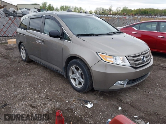 2012 Honda Odyssey EX-L with VIN 5FNRL5H68CB031930, listed as a IAAI auction lot 42222501 with 65,262 mi miles and . Bid and sale history available at DreamBid. Image 1.