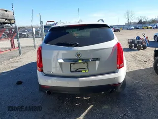 2011 Cadillac SRX Premium Collection with VIN 3GYFNCEY2BS624867, listed as a IAAI auction lot 41273945 with 209,296 mi miles. Bid and sale history available at carsss.com. Image 16.