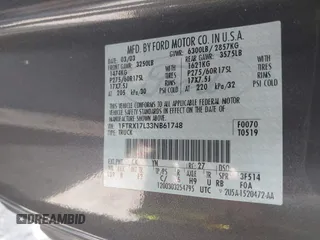 2003 Ford F-150 XL with VIN 1FTRX17L33NB61748, listed as a IAAI auction lot 41789730 with 301,092 mi miles. Bid and sale history available at carsss.com. Image 9.