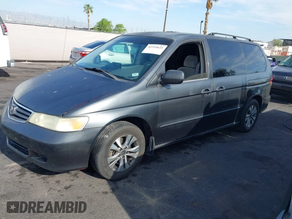2002 Honda Odyssey EX with VIN 2HKRL18632H512158, listed as a IAAI auction lot 42354621 with 240,373 mi miles and . Bid and sale history available at DreamBid. Image 13.