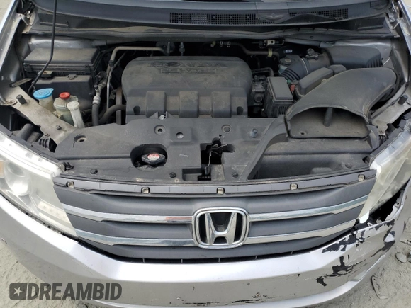 2012 Honda Odyssey Touring with VIN 5FNRL5H93CB121366, listed as a Copart auction lot 55383885 with 197,885 mi miles and Salvage title. Bid and sale history available at DreamBid. Image 12.