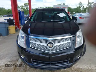 2012 Cadillac SRX Premium Collection z VIN 3GYFNCE36CS615725, wystawiony jako IAAI lot #42738584 z przebiegiem 156 625 mil mil oraz . Historia ofert i sprzedaży dostępna na DreamBid. Obrazek 6.