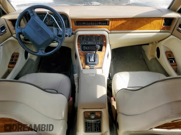 1994 Jaguar XJ с VIN SAJKX174XRC692378, выставлен на аукционе Copart как лот 65275795 с пробегом 80 748 миль миль и Чистый • Clean title. История ставок и продаж доступна на DreamBid. Изображение 8.